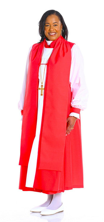 Smiling woman in a red clergy robe, standing confidently with a white background.