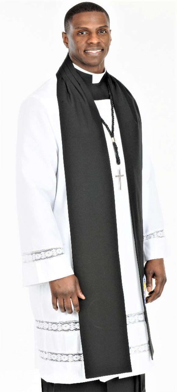 A clergyman wearing a Class A vestment, featuring a white robe and black scarf, representing traditional ecclesiastical attire.