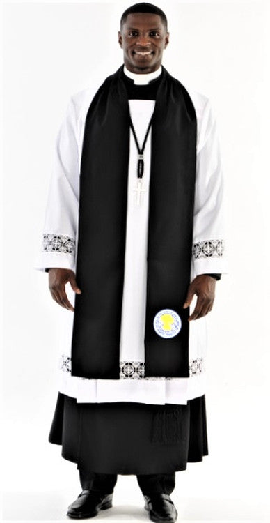 A man wearing COGIC Class A Vestments, including a cassock, cincture, surplice, and tippet, showcasing a traditional look.