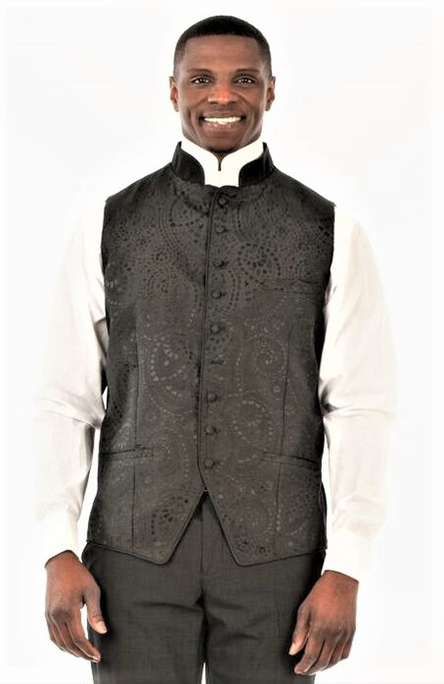 Men's Clergy Vests displayed by a model in a black vest, showcasing intricate patterns and a classic look.