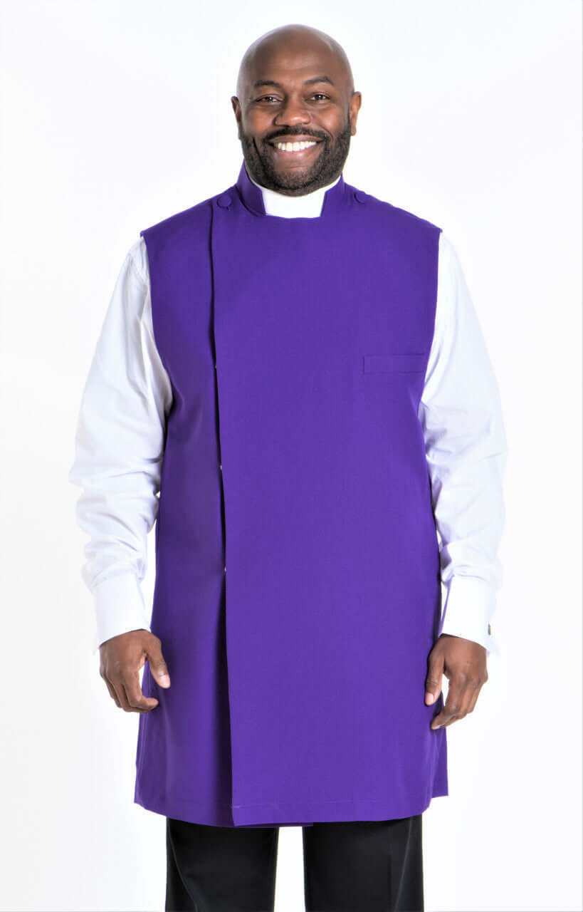 Clergy Apron In Purple worn by a smiling man, showcasing the high-quality viva material and full cut fit design.