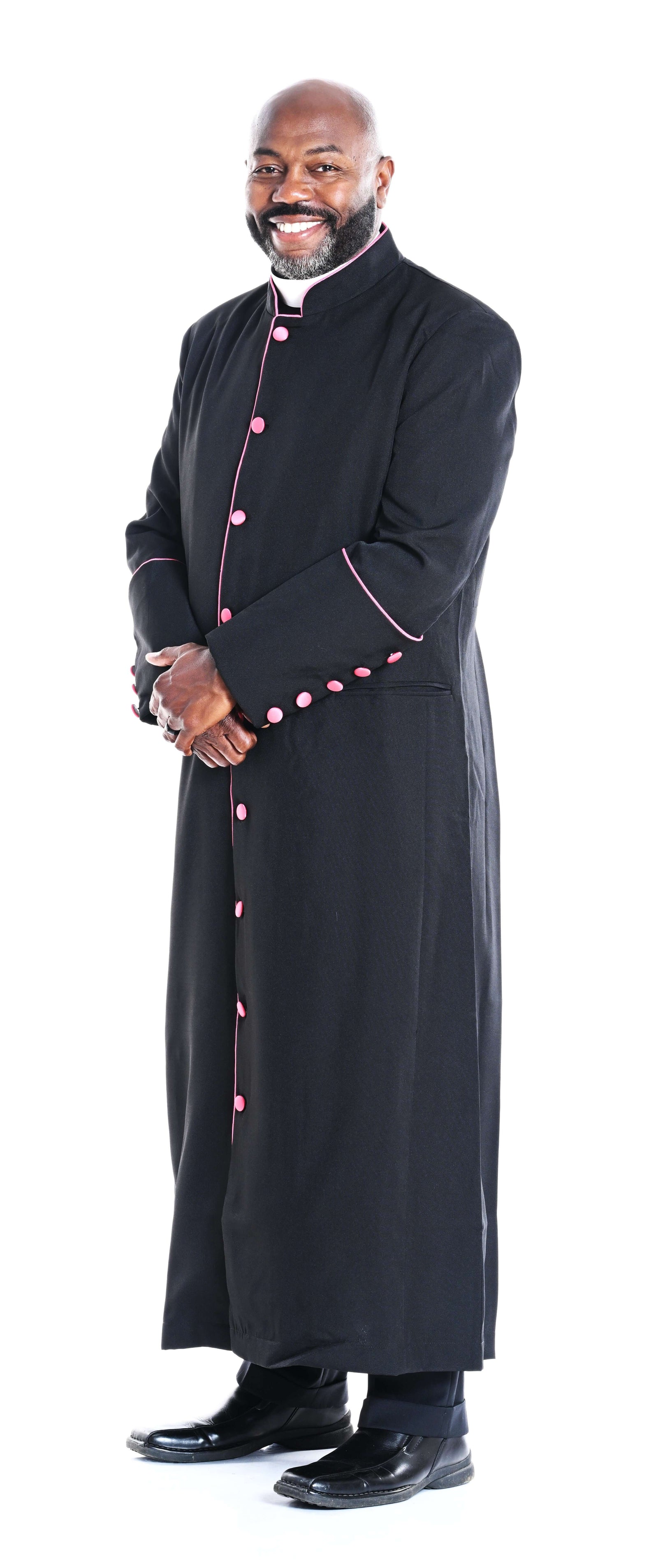 Men's Adam Clergy Robe in Black & Fuchsia worn by a smiling man, showcasing stylish trim and buttons.
