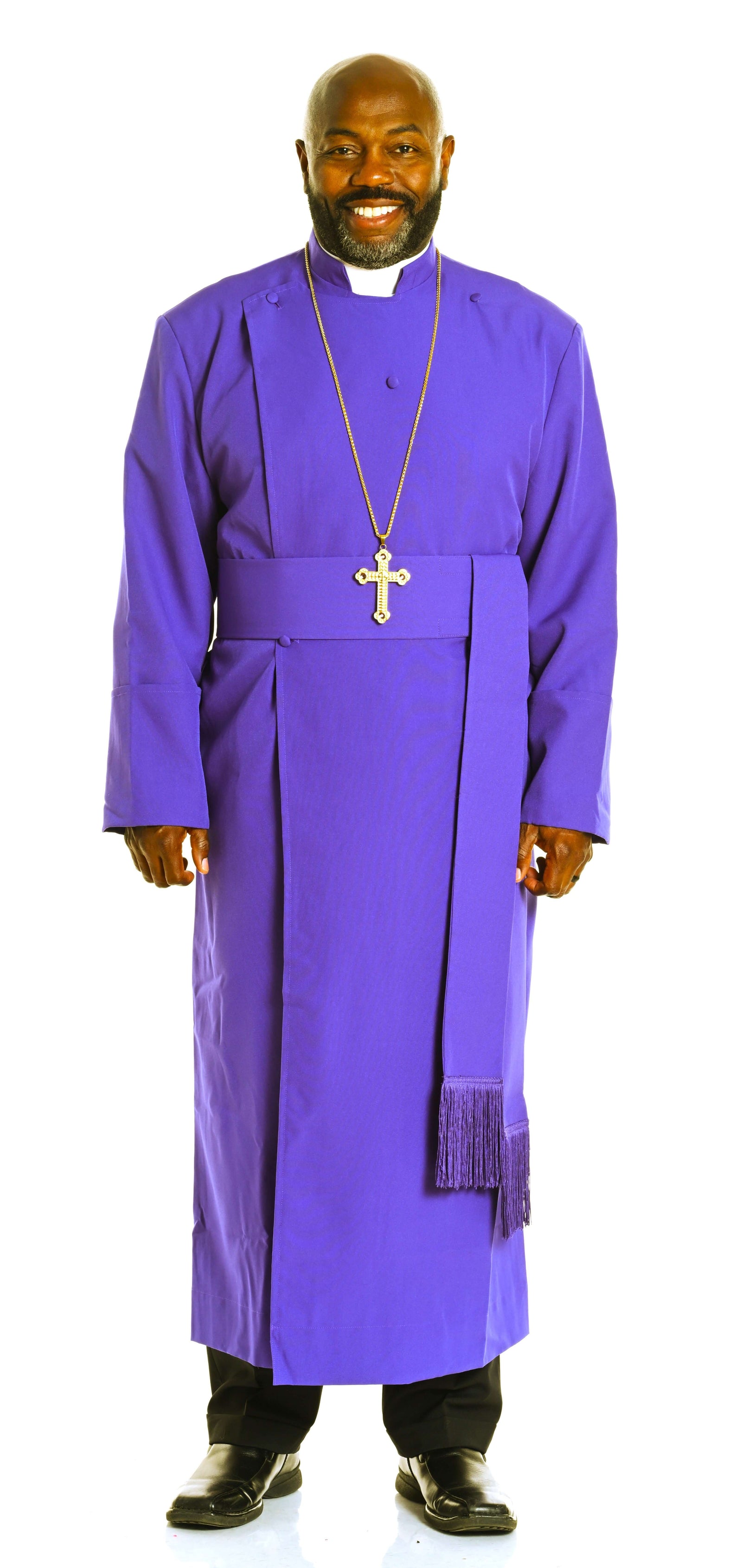 Men's Anglican Clergy Robe Cassock With Matching Cincture Belt In Purple, worn by a smiling clergy member.