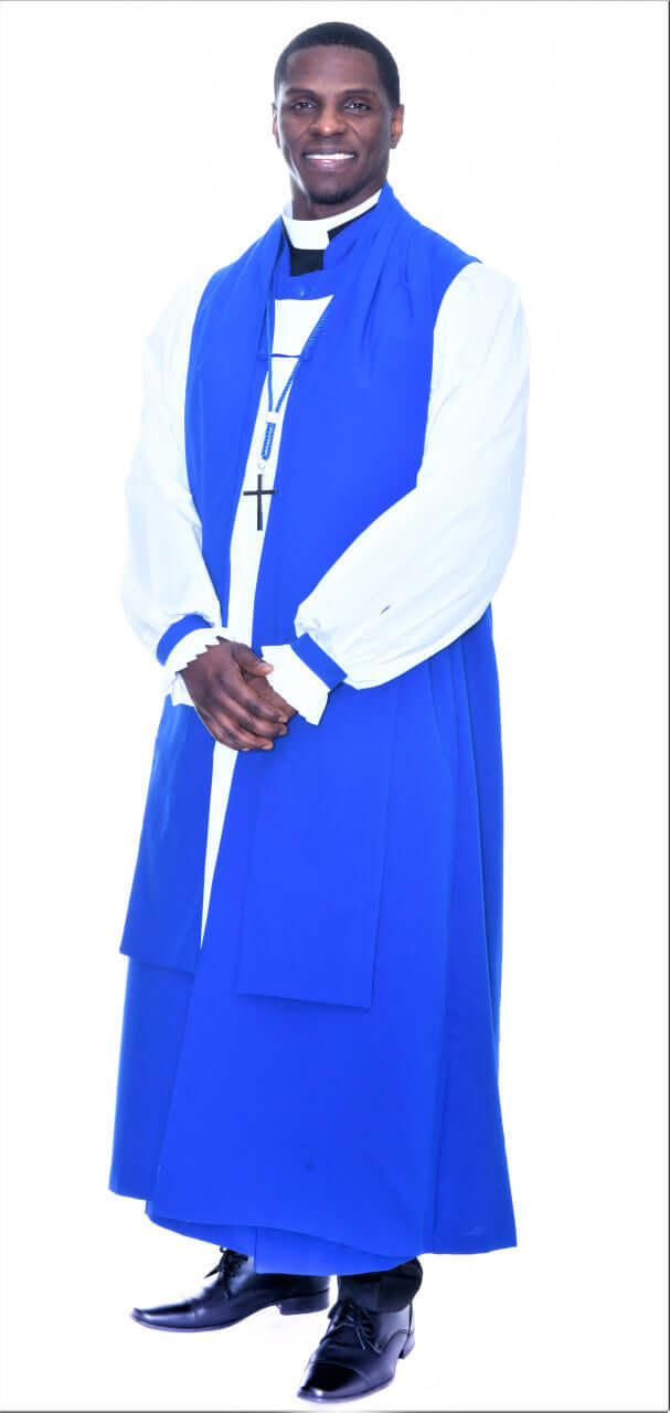 Men's Overseer Vestment In Royal Blue - 8 Pieces Included worn by a clergy member, showcasing royal blue attire and dignified style.