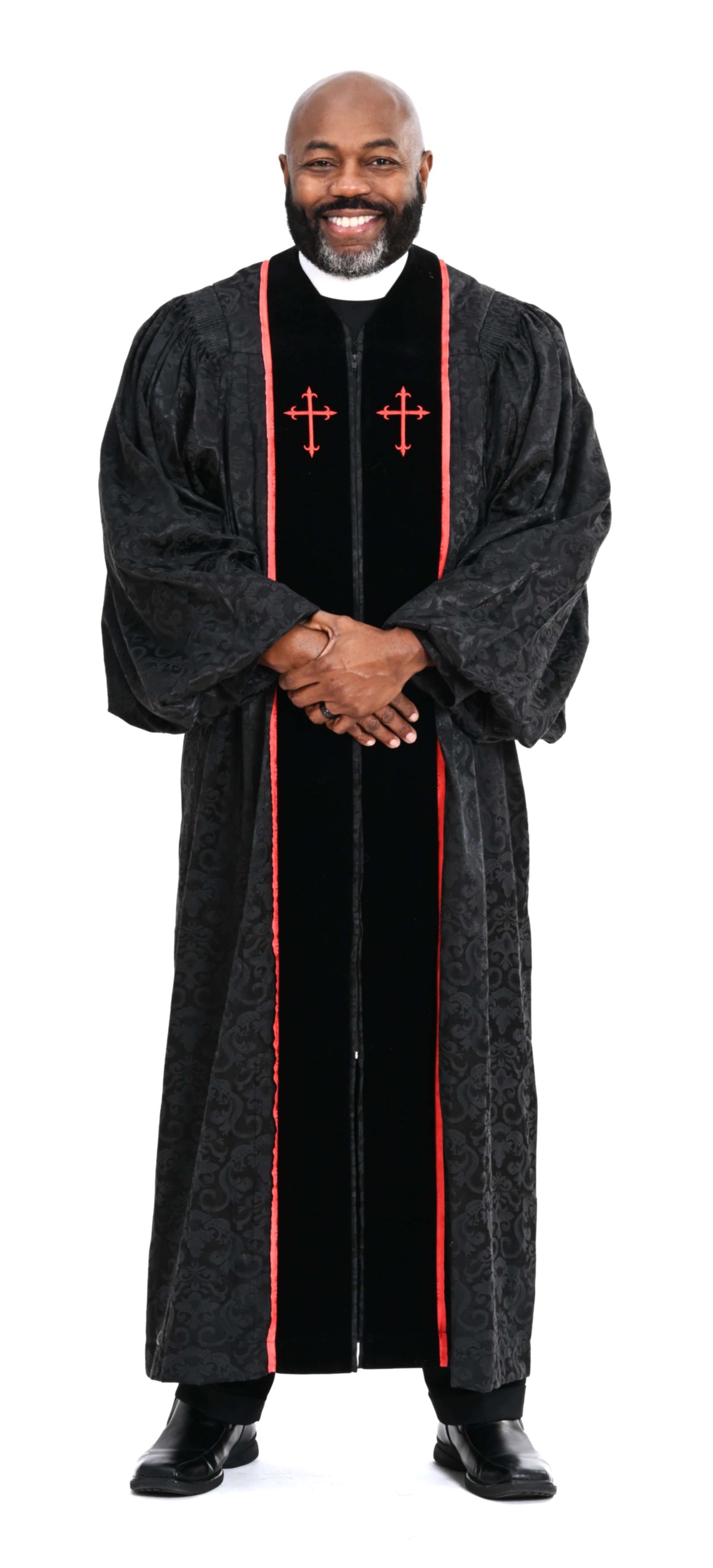 Men's RT Wesley Pulpit Robe in Black & Red worn by a man, showcasing metallic ribbon trim and flared crosses.