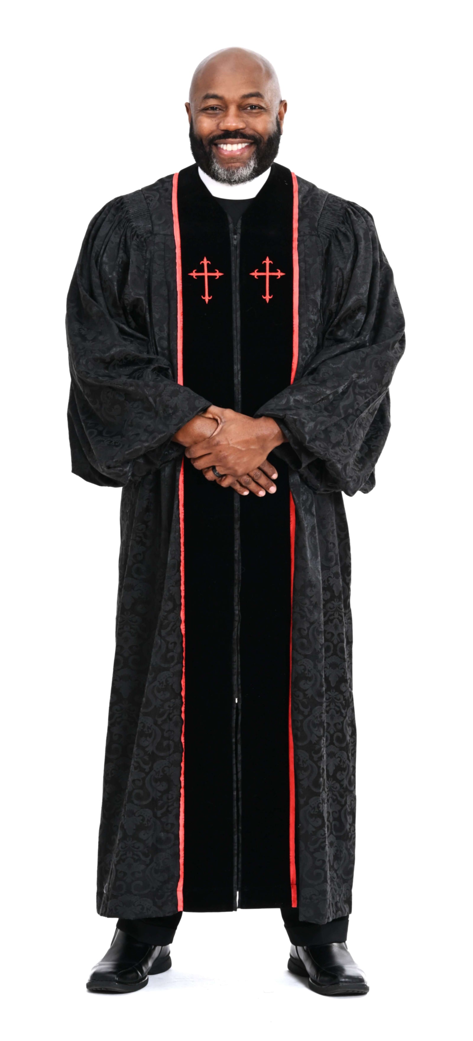 Men's RT Wesley Pulpit Robe in Black & Red worn by a man, showcasing metallic ribbon trim and flared crosses.